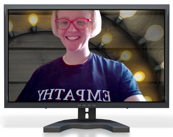 Image of computer with presenter with 't' shirt with word 'empathy'